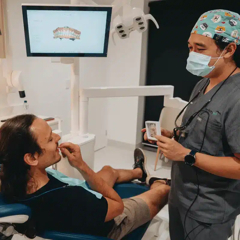 Patient reviewing digital scan results with dentist at Dentistry First
